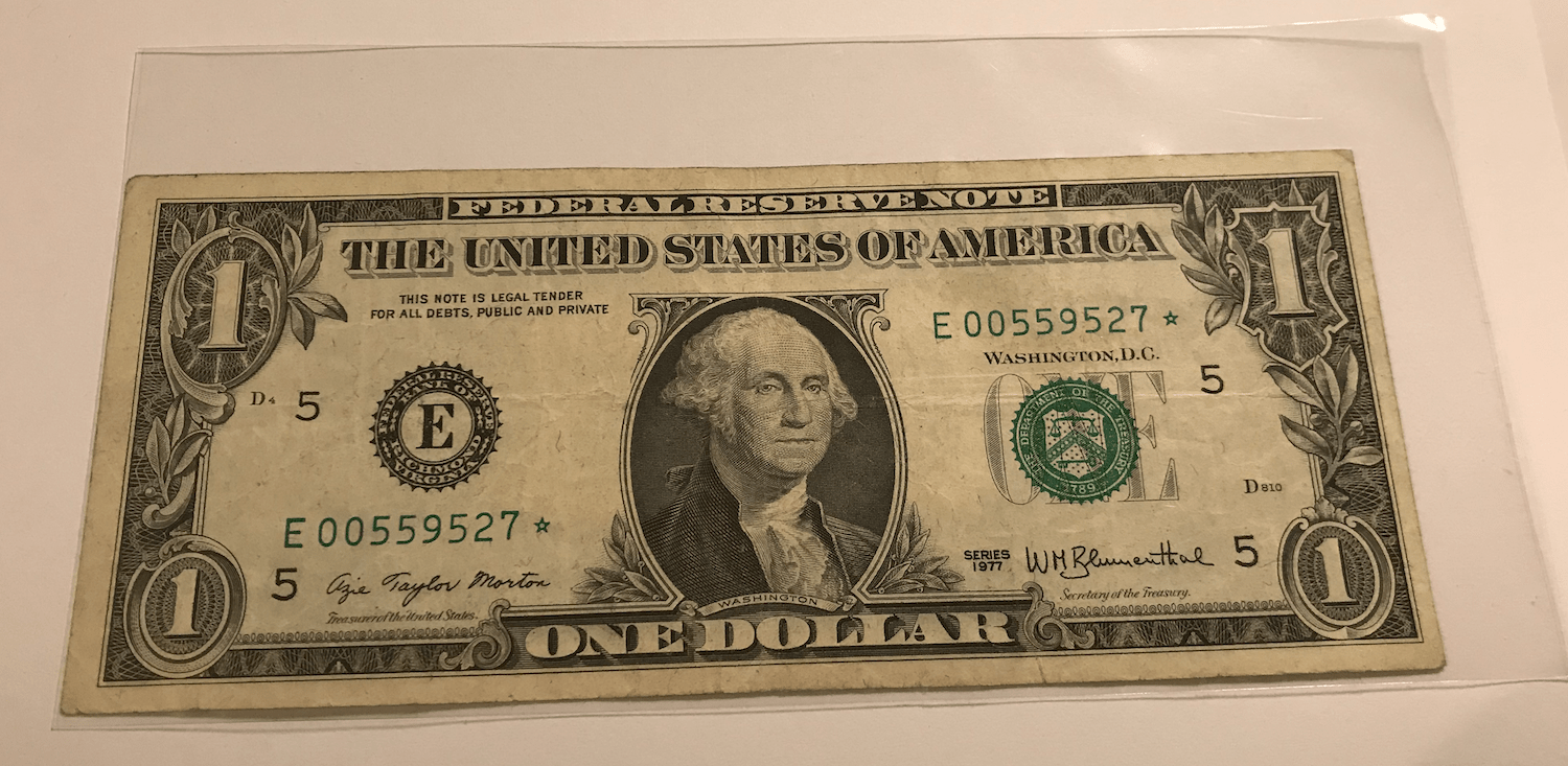 Starszy banknot 1 dollar z gwiazdką, seria zastępcza z 1977 roku.